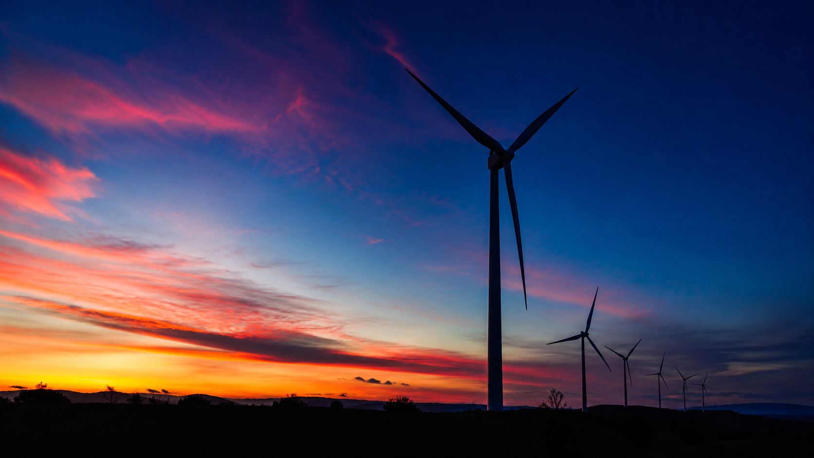Wind turbines at sunset